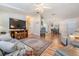 Bright living room with hardwood floors and comfortable seating at 37601 Neukom Ave, Zephyrhills, FL 33541