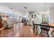 Open concept living area with hardwood floors and ample natural light at 37601 Neukom Ave, Zephyrhills, FL 33541