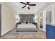 Spacious bedroom with king-size bed and hardwood floors at 130 4Th N Ave # 204-206, St Petersburg, FL 33701