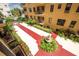 Shared courtyard with fountain and red tile walkways at 130 4Th N Ave # 204-206, St Petersburg, FL 33701