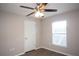 Bright bedroom with ceiling fan and window coverings at 5239 Tummel Ct, Wesley Chapel, FL 33545