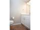 Clean bathroom with white cabinets and tile flooring at 5239 Tummel Ct, Wesley Chapel, FL 33545