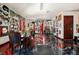Dining area with metallic epoxy floor and artwork at 909 Shoals Landing Dr, Brandon, FL 33511