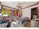Bedroom with ceiling fan and large window at 909 Shoals Landing Dr, Brandon, FL 33511