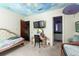 Bedroom with a daybed, vanity, and an ensuite bathroom at 909 Shoals Landing Dr, Brandon, FL 33511