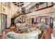 Two-story living room with hardwood floors, a grand staircase, and a high ceiling at 909 Shoals Landing Dr, Brandon, FL 33511