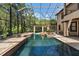 Inviting screened pool and spa perfect for relaxation and entertaining at 909 Shoals Landing Dr, Brandon, FL 33511