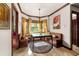 Bright breakfast nook with built-in banquette seating and a window seat at 909 Shoals Landing Dr, Brandon, FL 33511