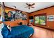 Bedroom with large window and hardwood floors at 909 Shoals Landing Dr, Brandon, FL 33511