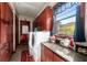 Spacious laundry room with washer, dryer, and ample cabinetry at 909 Shoals Landing Dr, Brandon, FL 33511