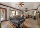 Main bedroom suite with sitting area and access to the outside at 909 Shoals Landing Dr, Brandon, FL 33511