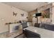 Outdoor kitchen with stainless steel appliances and a stone fireplace at 909 Shoals Landing Dr, Brandon, FL 33511