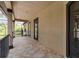 Covered balcony with tile flooring and access to the outdoors at 909 Shoals Landing Dr, Brandon, FL 33511