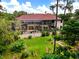 Large home with pool and screened lanai overlooking a lush backyard at 909 Shoals Landing Dr, Brandon, FL 33511
