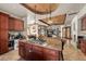 Open kitchen with large island and gas cooktop at 909 Shoals Landing Dr, Brandon, FL 33511