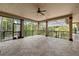 Large covered patio with tile flooring and screened enclosure at 909 Shoals Landing Dr, Brandon, FL 33511
