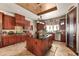 Island kitchen with granite countertops and stainless steel appliances at 909 Shoals Landing Dr, Brandon, FL 33511