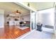 Private patio with sliding glass doors and a built-in grill at 26607 Chimney Spire Ln, Wesley Chapel, FL 33544