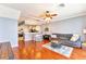 Spacious living room with hardwood floors and comfortable seating at 26607 Chimney Spire Ln, Wesley Chapel, FL 33544