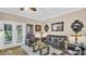 Living room with leather furniture and French doors at 121 Valencia Cir, St Petersburg, FL 33716