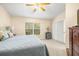 Large bedroom with king bed and access to a sliding door at 9343 Rolling Circle, San Antonio, FL 33576