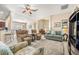 Open concept living area with ample natural light and comfortable furnishings at 9343 Rolling Circle, San Antonio, FL 33576