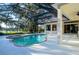 Screened pool and spa with lake view at 10071 Georgetown Ct, Weeki Wachee, FL 34613