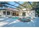 Large pool and spa with screened enclosure at 10071 Georgetown Ct, Weeki Wachee, FL 34613