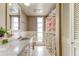 Bathroom featuring a vanity with a sink, drawers, cabinets, and a shower with a curtain at 1745 Harbor W Cir, Largo, FL 33770