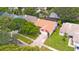 Aerial view of single-Gathering home with driveway and yard at 2011 Green Juniper Ln, Brandon, FL 33511