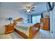 Spacious bedroom with wood furniture and ceiling fan at 2011 Green Juniper Ln, Brandon, FL 33511