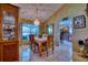 Formal dining room featuring a chandelier and hardwood floors at 2011 Green Juniper Ln, Brandon, FL 33511