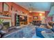 Relaxing living room with fireplace and leather seating at 2011 Green Juniper Ln, Brandon, FL 33511
