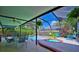 Spacious pool and spa with covered patio and seating at 2011 Green Juniper Ln, Brandon, FL 33511