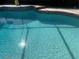 Sunlit in-ground pool with clear blue water, perfect for relaxation and recreation at 2011 Green Juniper Ln, Brandon, FL 33511
