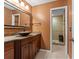 Bathroom with a stylish vanity, granite countertop and a glass enclosed shower at 5313 Bayshore Blvd # 5313, Tampa, FL 33611