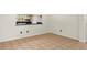 Bright living room with tile flooring and open view to the kitchen at 5313 Bayshore Blvd # 5313, Tampa, FL 33611