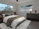 Main bedroom with large window and stylish dresser at 6026 22Nd N Ave # 5, St Petersburg, FL 33710