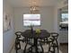 Modern dining room with a round table and six chairs at 6026 22Nd N Ave # 5, St Petersburg, FL 33710