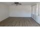 Spacious living room with wood-look floors and lots of natural light at 6026 22Nd N Ave # 5, St Petersburg, FL 33710