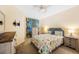 Guest bedroom with a comfortable bed and plenty of storage at 1200 Country Club Dr # 5303, Largo, FL 33771