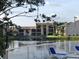 Relaxing pool area with fountain and lounge chairs at 3845 S Lake Dr # 192, Tampa, FL 33614