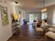 Elegant dining area with glass table and modern chandelier at 2363 Newburg Ln # B, Safety Harbor, FL 34695