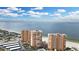 Aerial perspective of three high-rise buildings near the beach, offering expansive ocean and city views at 17920 Gulf Blvd # 205, Redington Shores, FL 33708
