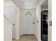 Bright entryway with white door and tile floors at 5313 Bayshore Blvd # 5313, Tampa, FL 33611