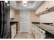 Modern kitchen with light wood cabinets and granite countertops at 5313 Bayshore Blvd # 5313, Tampa, FL 33611
