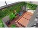 Private courtyard with lush landscaping and serene Buddha statue at 5313 Bayshore Blvd # 5313, Tampa, FL 33611