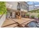 Spacious patio with multiple seating areas, lush landscaping, and access to interior at 5313 Bayshore Blvd # 5313, Tampa, FL 33611