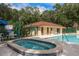 Community hot tub adjacent to the refreshing pool at 2705 14Th Ct, Palm Harbor, FL 34684