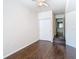 Bedroom with hardwood floors, double closet and bathroom access at 410 S Armenia Ave # 925, Tampa, FL 33609